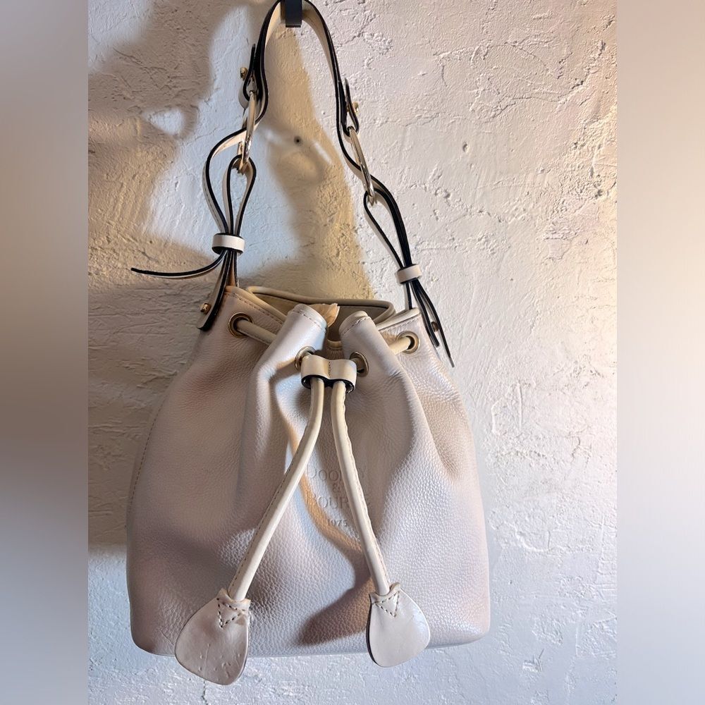 Dooney&Bourke Vintage rare collectible bag,  bucket drawstring, ivory gold tone